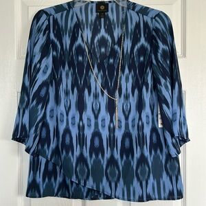 JM Collection top with cute tassel connected to the front